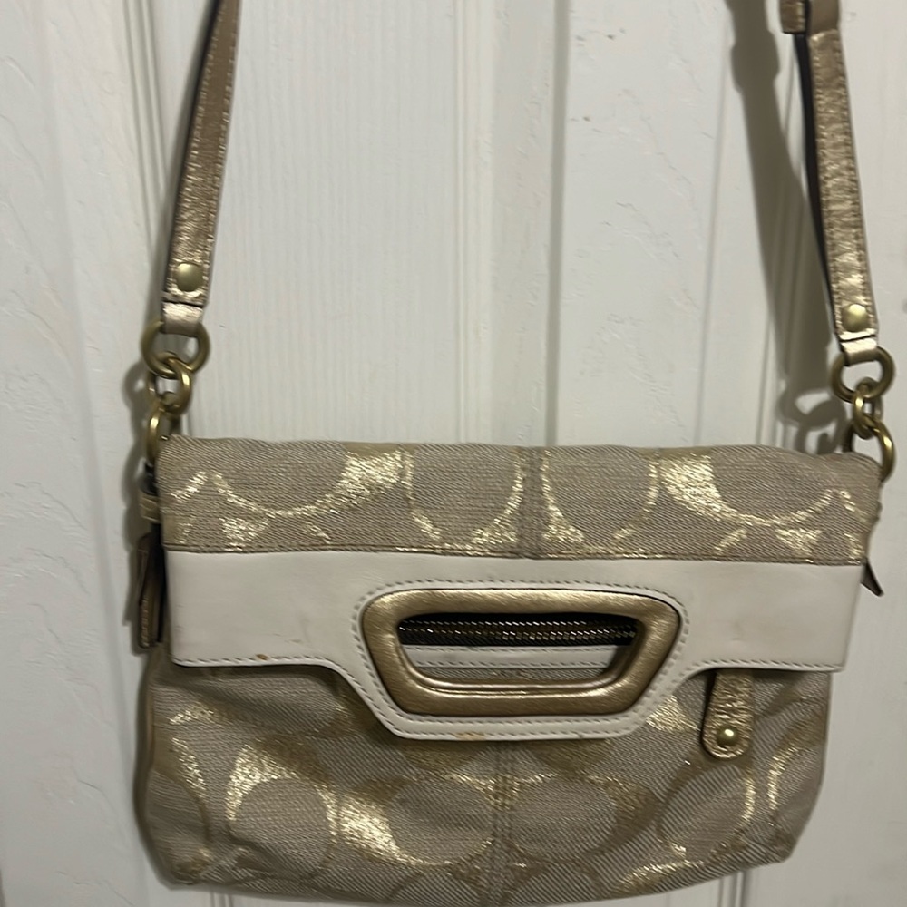Coach beige/gold shoulder bag.